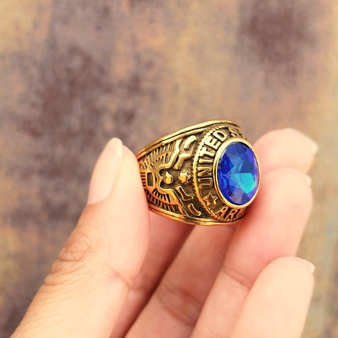 ANILLO ARMY DORADO PIEDRA AZUL