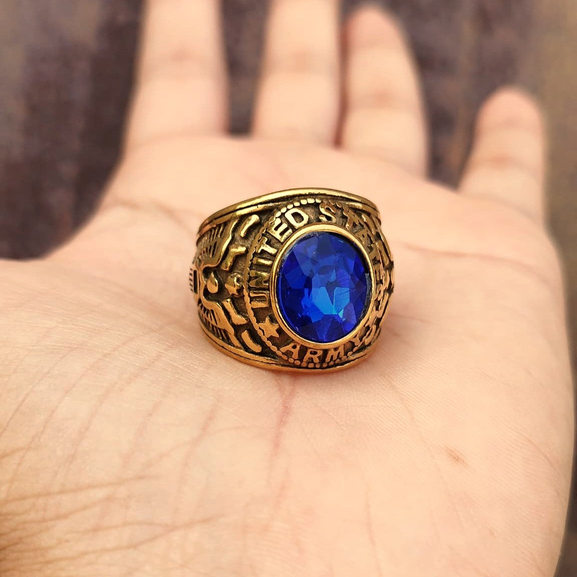 ANILLO ARMY DORADO PIEDRA AZUL