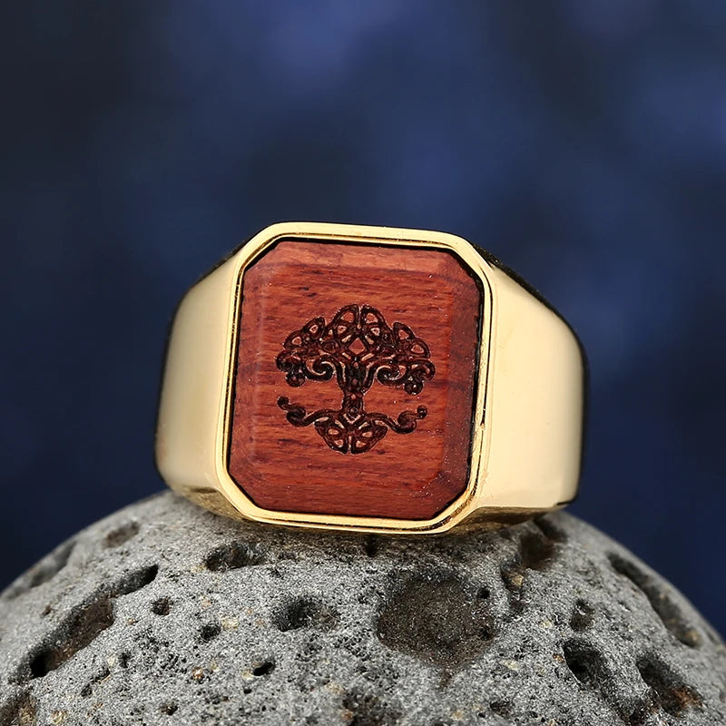 ANILLO DORADO PIEDRA ROJA ARBOL