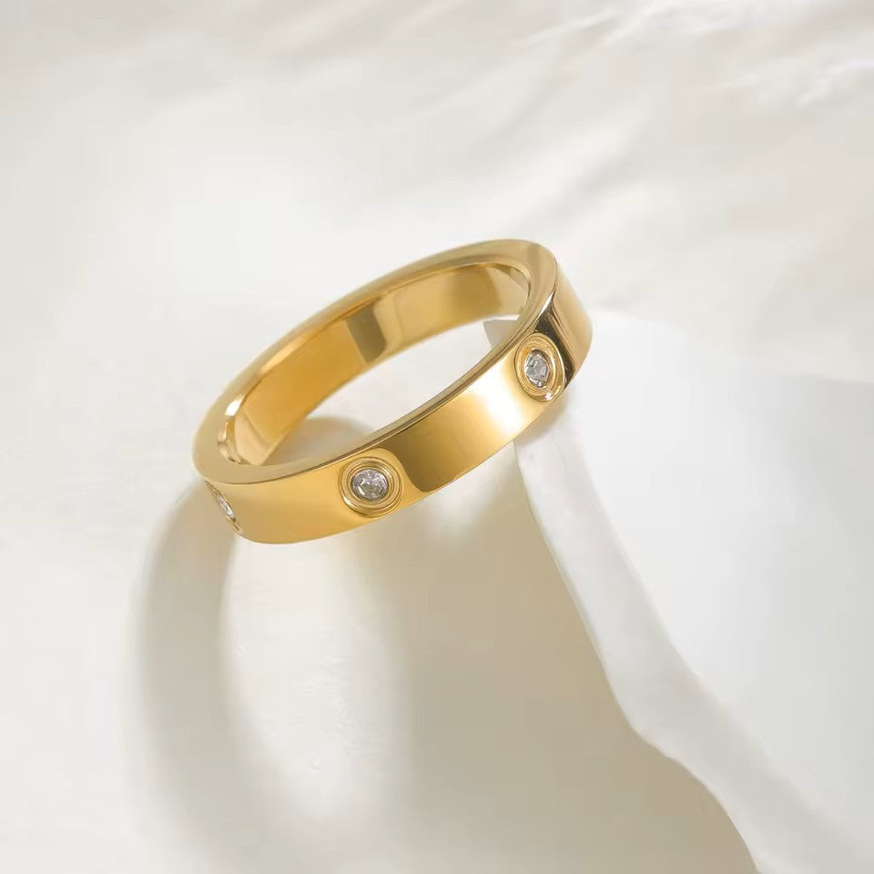 ANILLO LISO CON PIEDRAS