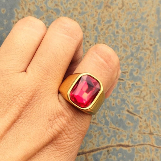 ANILLO DORADO PIEDRA ROJA