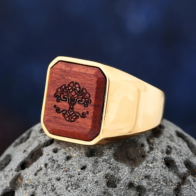 ANILLO DORADO PIEDRA ROJA ARBOL